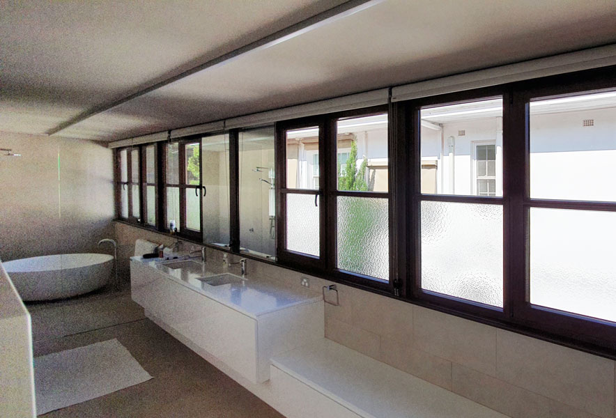 Jewel Box - Heritage windows, opening as tilt & turn, partly frosted for privacy 
